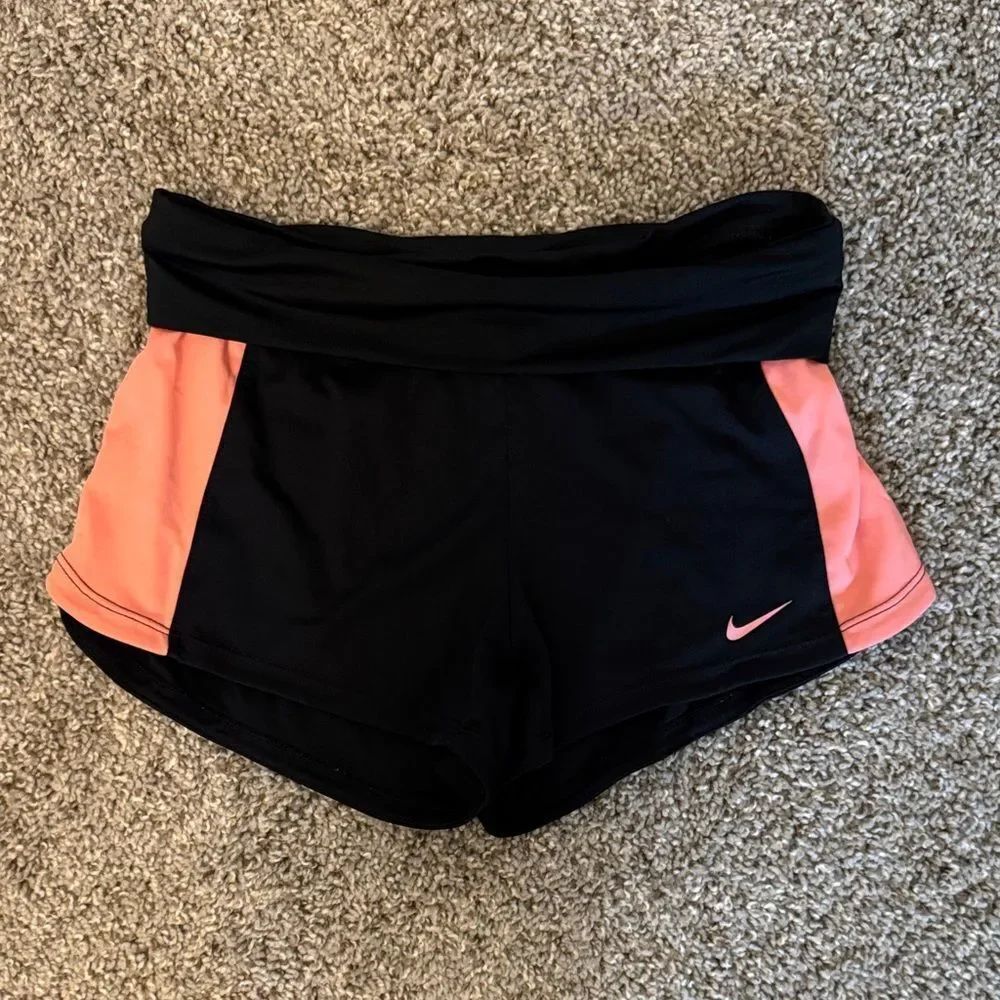 Nike Women's Black Athletic Shorts with Coral Side Panels